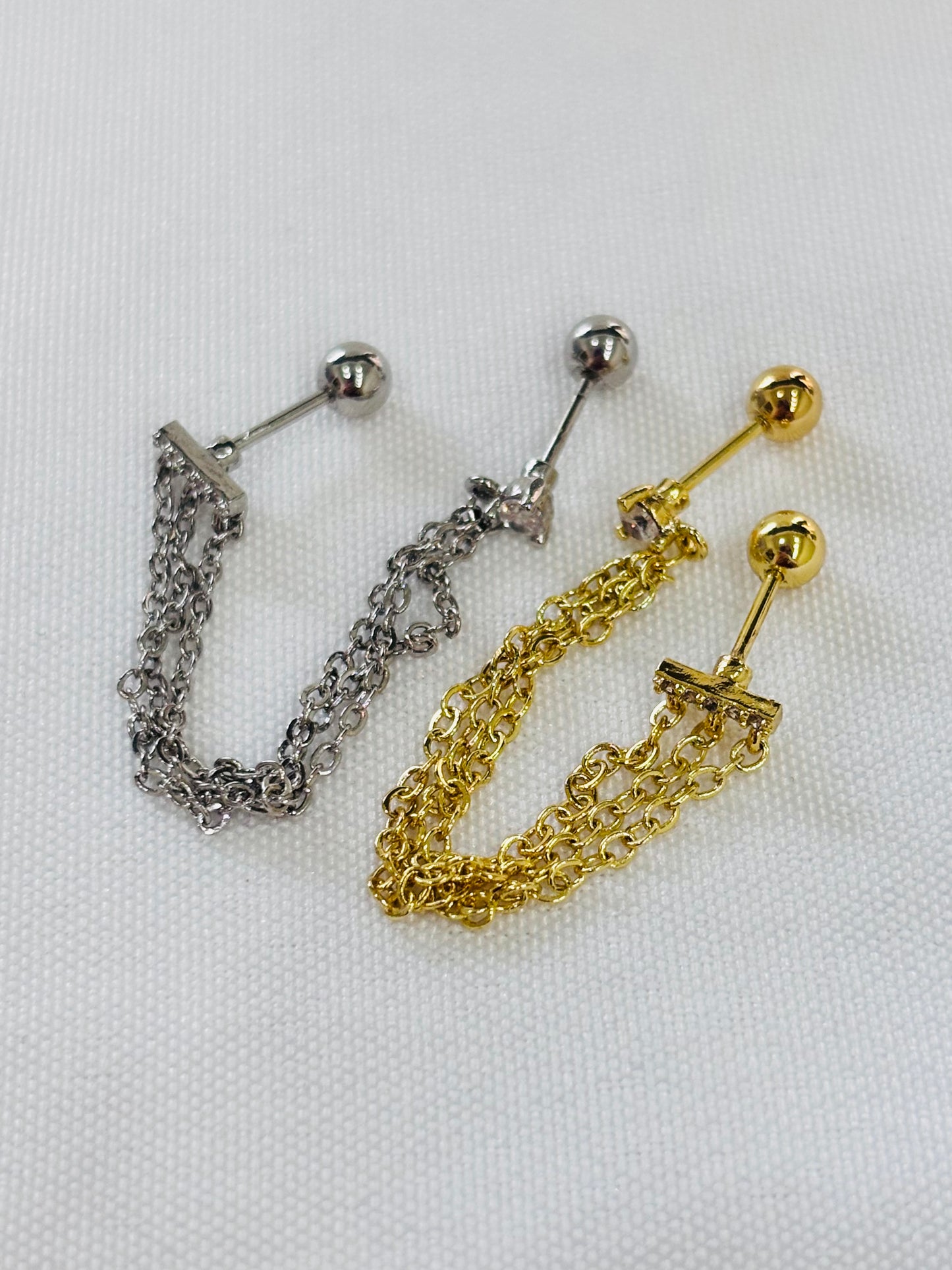 PIERCING DOBLE DORADO