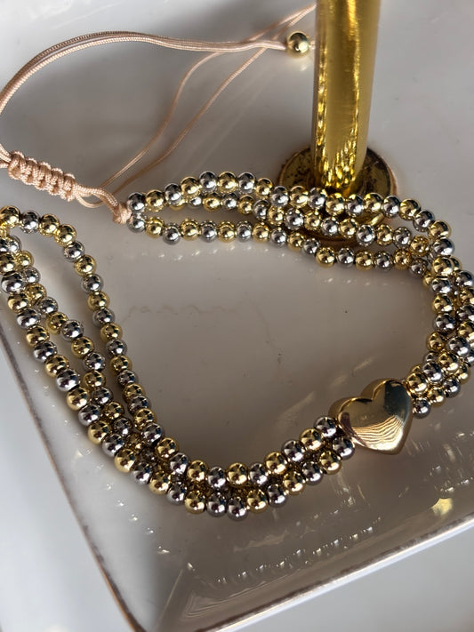 Pulsera dorada con acabado brillante y estilo moderno en Chapa de Oro 18K de Mayoreo — joyería E|B 
