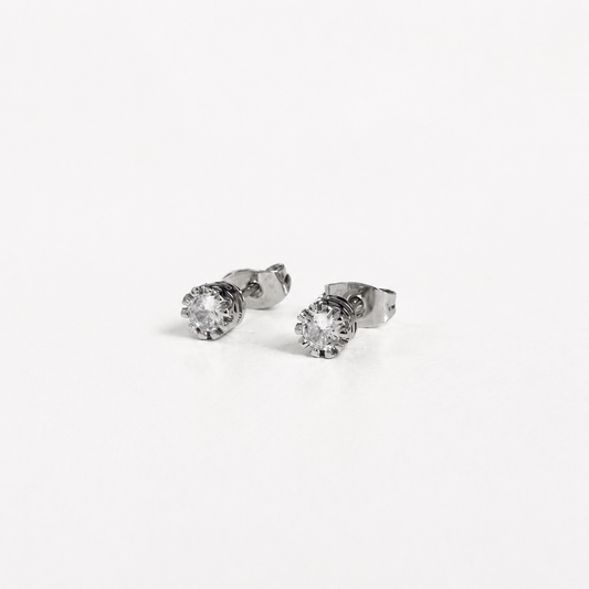 Broquel silver con piedra en chapa de oro blanco 18K para joyería de mayoreo.