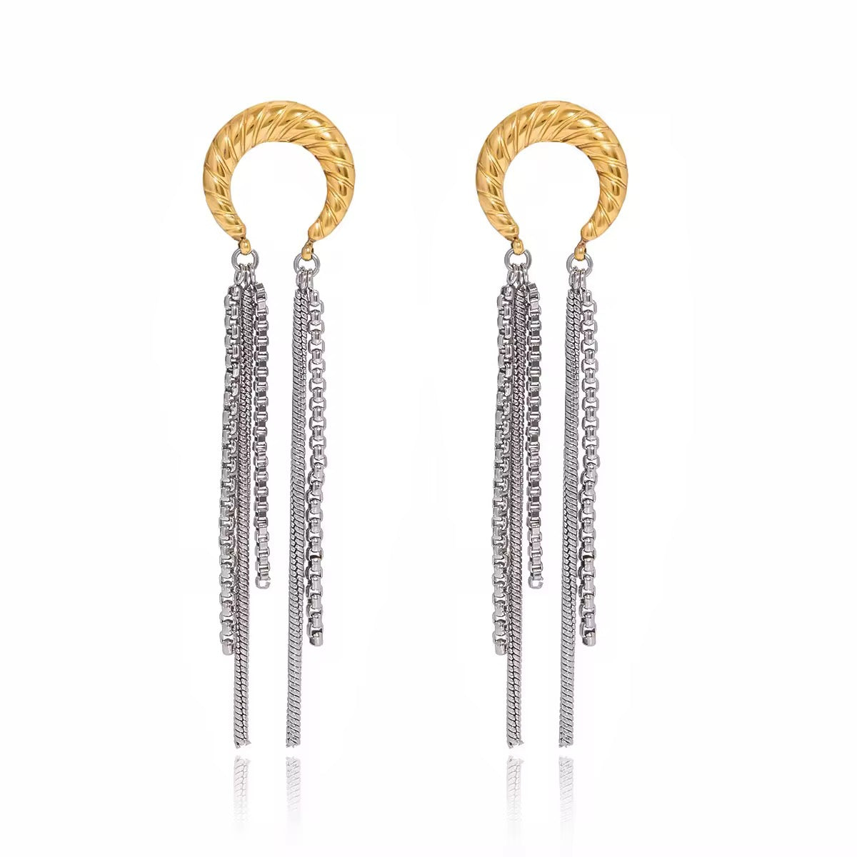 Aretes Luz Urbana en acero inoxidable 316L, estilo sofisticado con brillo urbano, joyería moderna premium.
