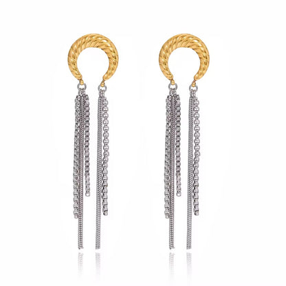 Aretes Luz Urbana en acero inoxidable 316L, estilo sofisticado con brillo urbano, joyería moderna premium.

