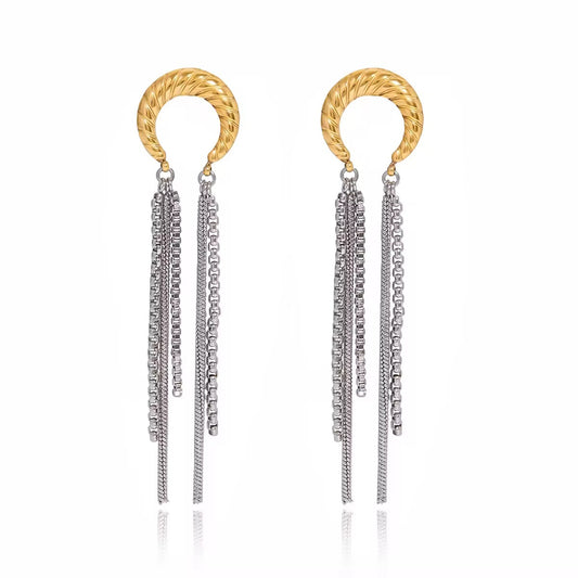 Aretes Luz Urbana en acero inoxidable 316L, estilo sofisticado con brillo urbano, joyería moderna premium.
