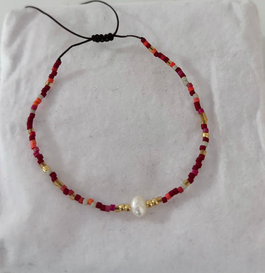 Pulsera cuentas rojas con perla