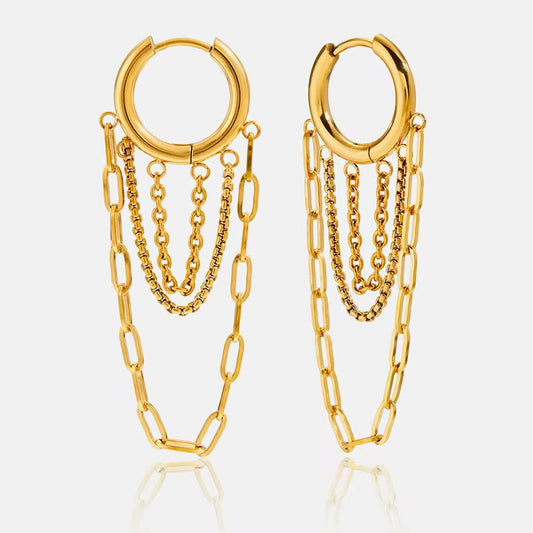 Aretes Luz Urbana en acero inoxidable 316L, estilo sofisticado con brillo urbano, joyería moderna premium.