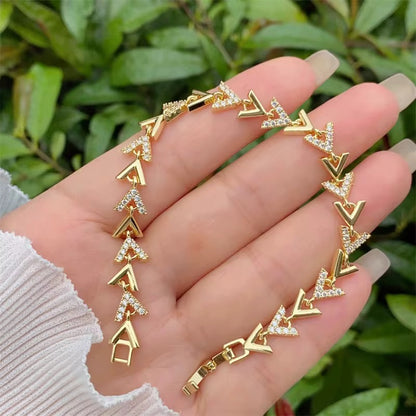 Pulsera dorada con cristales cuadrados, estilo elegante POR MAYOREO