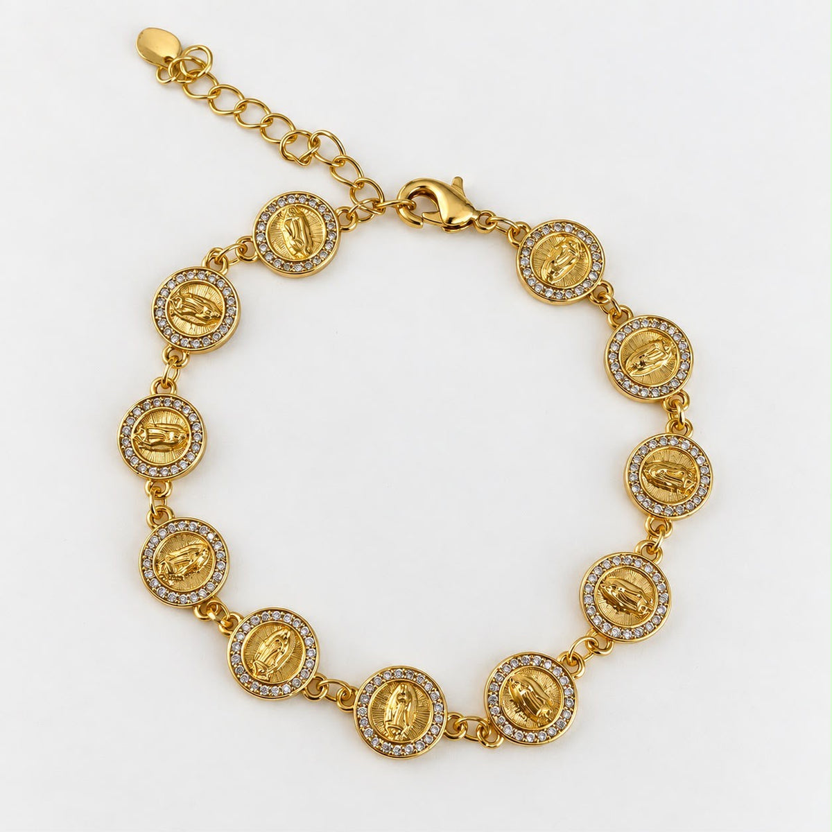 Pulsera dorada con medallones redondos y cristales