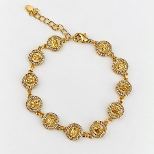 Pulsera dorada con medallones redondos y cristales