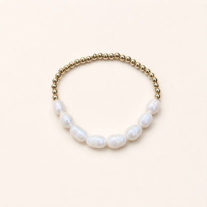 Pulsera con perlas de río naturales, accesorio femenino y elegante para venta de joyería de mayoreo.