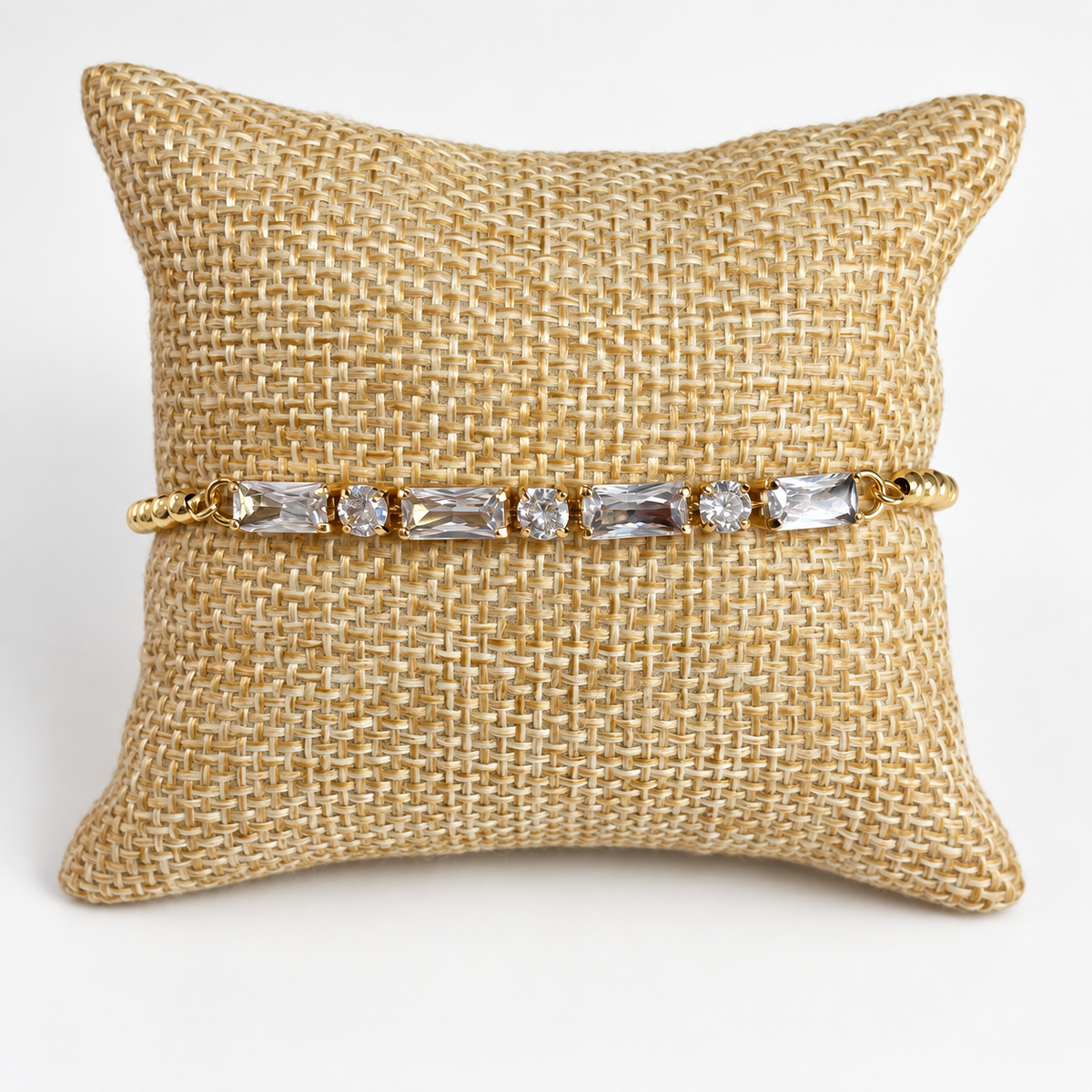 Pulsera ajustable dorada con cristales transparentes alargados