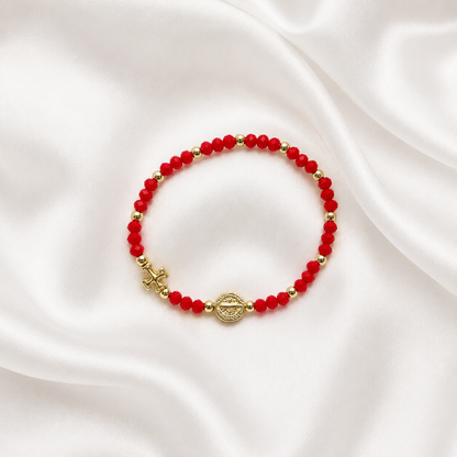 Pulsera de San Benito con cristales y detalles en chapa de oro para joyería de mayoreo, accesorio religioso con valor emocional para reventa.
